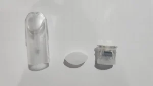 霧化芯拆解組件展示，包含發熱體隔絕層與透明吸嘴結構分析。